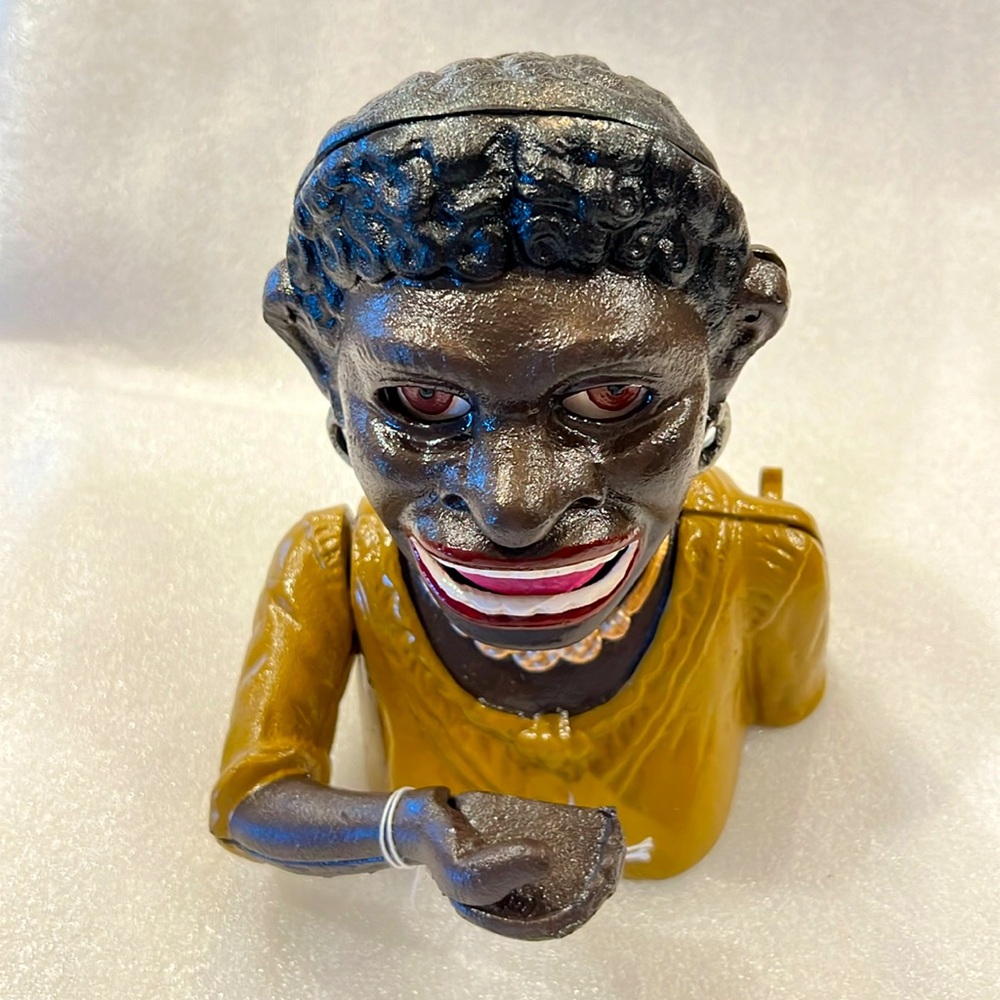 Vintage African American antique dime bank in excellent condition.